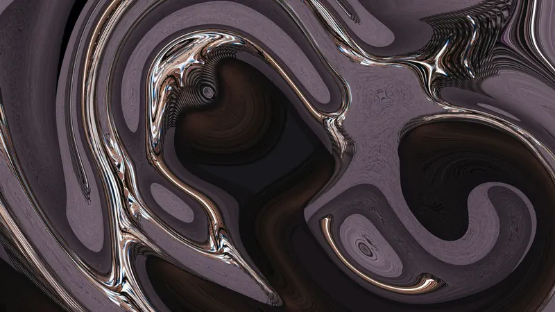 Close-up of swirling oil on a water surface